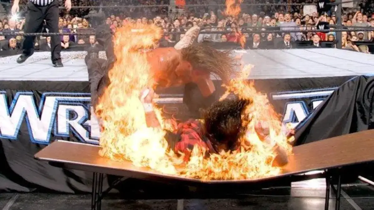 Edge mick foley flaming table wrestlemania 22